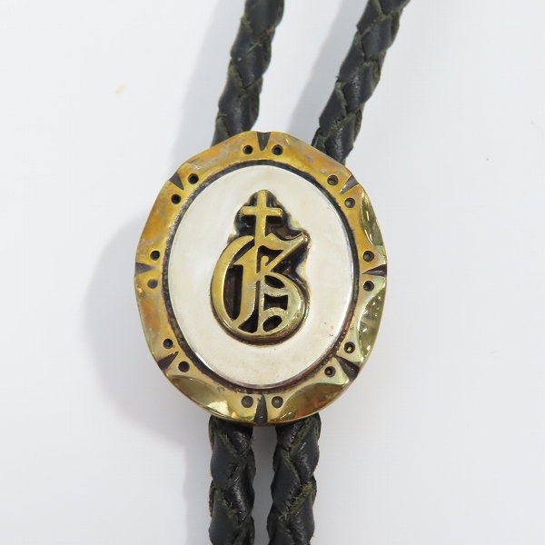 実際に弊社で買取させて頂いた（2）GANGSTERVILLE×Galcia/ギャングスタービル×ガルシア G ループタイ/ボロタイ/ブラス/シルバーの画像 1枚目