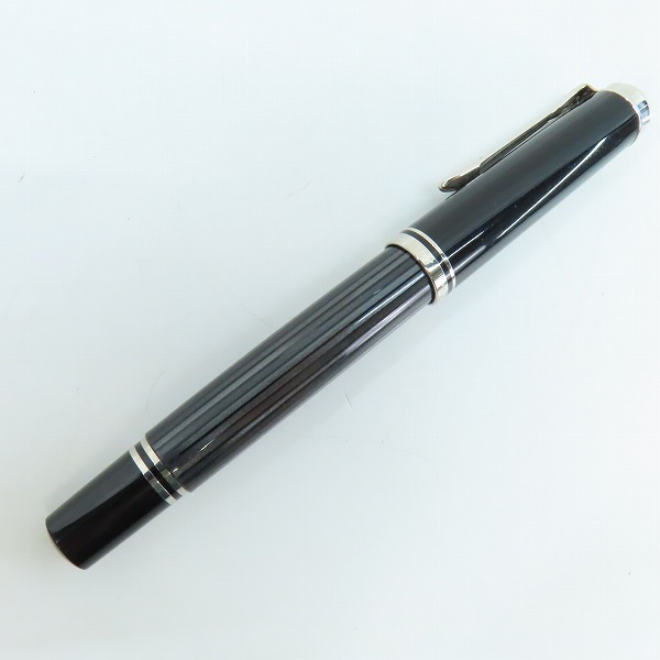 実際に弊社で買取させて頂いたPELIKAN/ペリカン スーべレーン ブラックストライプ キャップ式万年筆 ペン先14C-585 Fの画像 1枚目