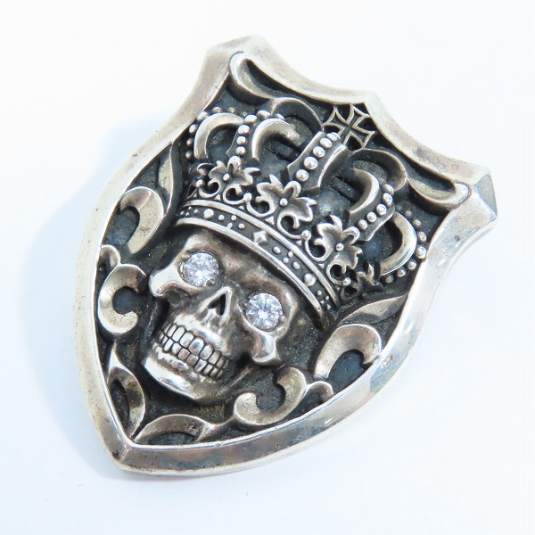 実際に弊社で買取させて頂いたJustin Davis/ジャスティンデイビス テンプテーションスカル 盾 ペンダントトップ