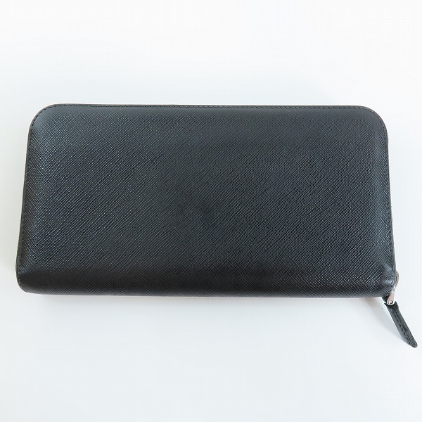 実際に弊社で買取させて頂いたPRADA/プラダ サフィアーノレザー ロゴ ラウンドジップ長財布の画像 1枚目