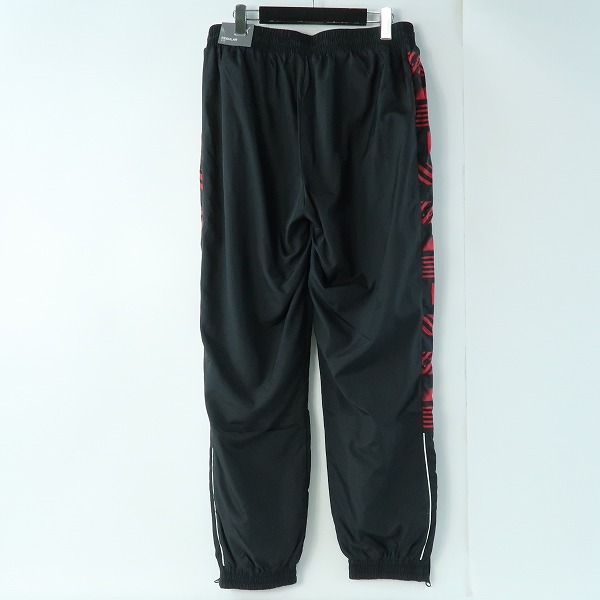 実際に弊社で買取させて頂いた【未使用】PUMA/プーマ ACミラン 21/22 FTBLHERITAGE トラックパンツ 765096-01/Lの画像 1枚目