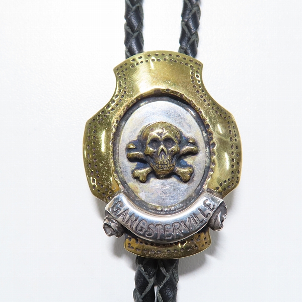 実際に弊社で買取させて頂いた(1)GANGSTERVILLE×Galcia/ギャングスタービル×ガルシア スカル ボロタイ シルバー×真鍮の画像 1枚目