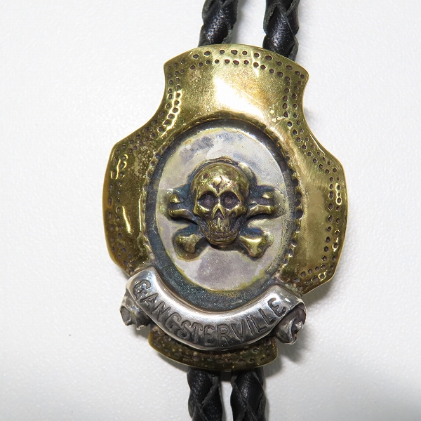 実際に弊社で買取させて頂いた(2)GANGSTERVILLE×Galcia/ギャングスタービル×ガルシア スカル ボロタイ シルバー×真鍮の画像 1枚目