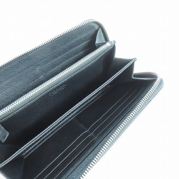 実際に弊社で買取させて頂いたPRADA/プラダ サフィアーノレザー ロゴ ラウンドジップ長財布の画像 3枚目