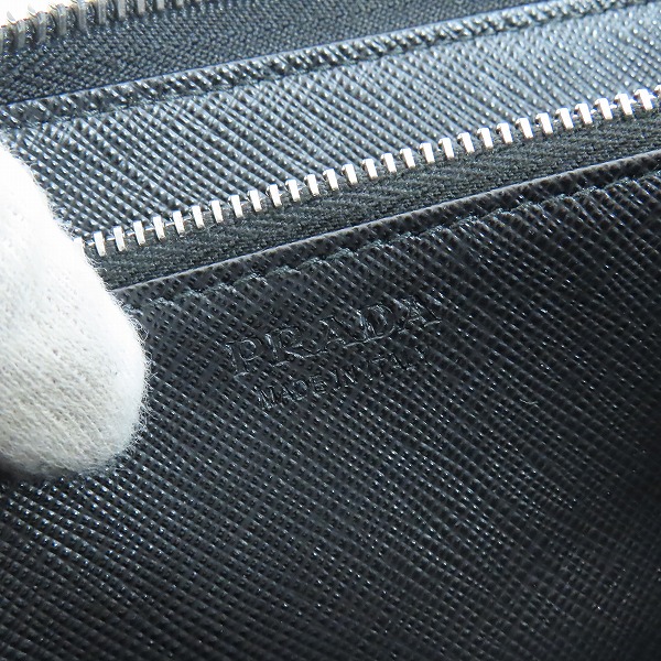 実際に弊社で買取させて頂いたPRADA/プラダ サフィアーノ ラウンドジップウォレット 長財布 2ML317の画像 6枚目