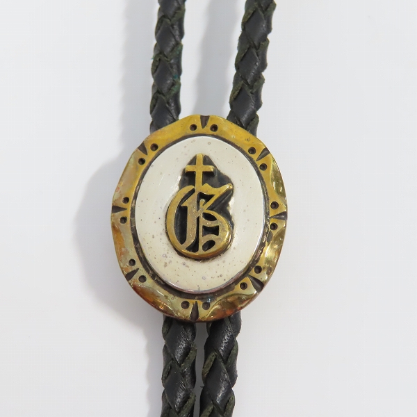 実際に弊社で買取させて頂いた（5）GANGSTERVILLE×Galcia/ギャングスタービル×ガルシア G ループタイ/ボロタイ/ブラス/シルバーの画像 1枚目