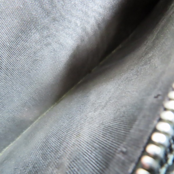 実際に弊社で買取させて頂いたPRADA/プラダ サフィアーノレザー ロゴ ラウンドジップ長財布の画像 6枚目