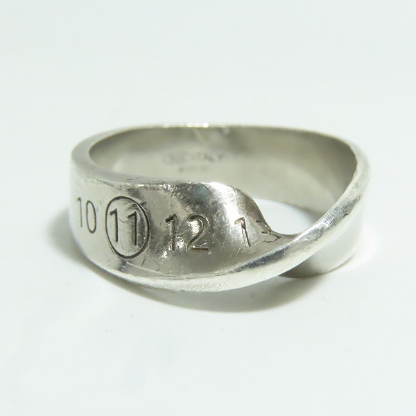 実際に弊社で買取させて頂いたMaison Martin Margiela/メゾンマルタンマルジェラ TWIST RING/ツイストリング ナンバリングロゴ SM1UQ0057/27.5-28号の画像 1枚目