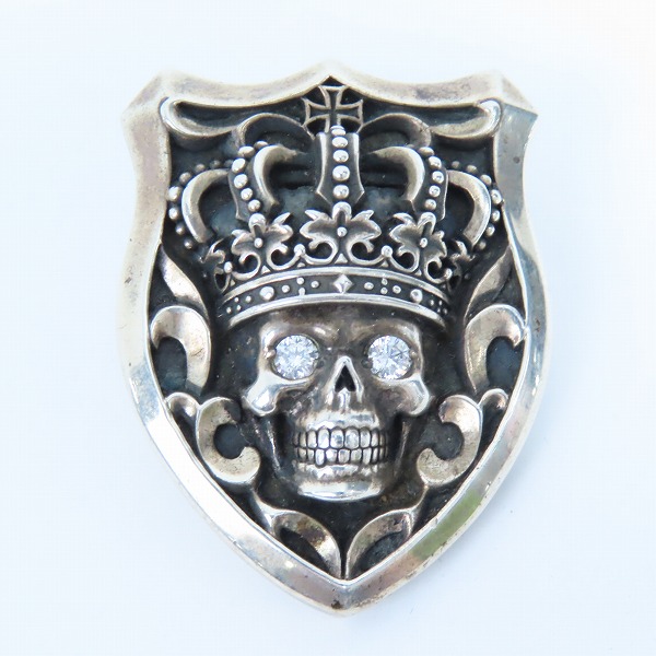 実際に弊社で買取させて頂いたJustin Davis/ジャスティンデイビス テンプテーションスカル 盾 ペンダントトップの画像 1枚目