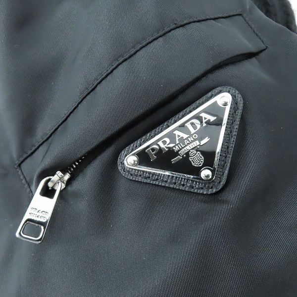 実際に弊社で買取させて頂いた【JPタグ】PRADA/プラダ Re-Nylon 三角ロゴプレート カシミアウール切替 ジップアップパーカー P25L34 S222 109R/36の画像 8枚目