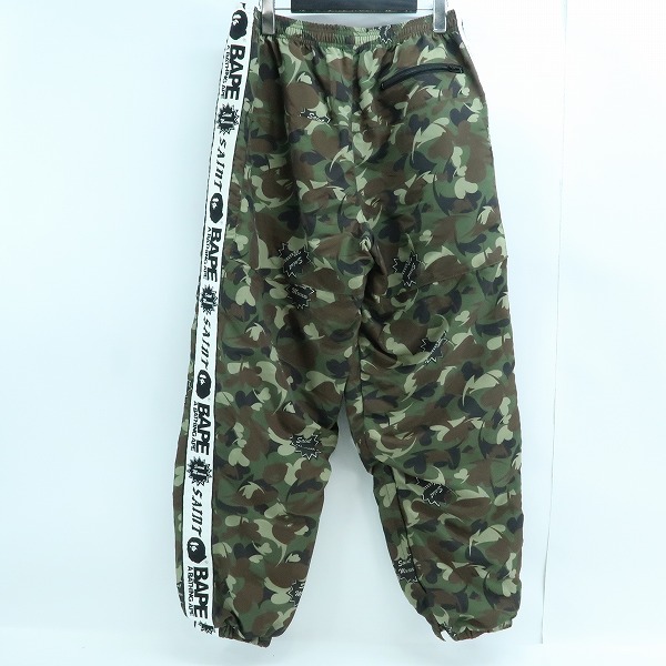 実際に弊社で買取させて頂いたA BATHING APE×SAINT MICHAEL/エイプ×セントマイケル HEART CAMO TRACK PANTS/カモフラ/迷彩 パンツ/Lの画像 1枚目