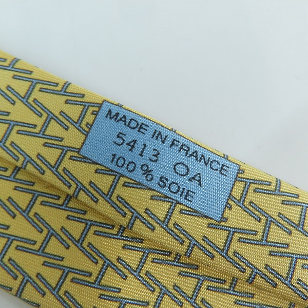 実際に弊社で買取させて頂いたHERMES/エルメス 総柄 イエロー シルク  ネクタイの画像 4枚目