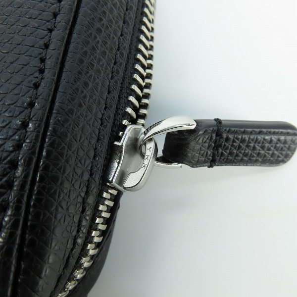 実際に弊社で買取させて頂いたTUMI/トゥミ ラウンドジップ 長財布 ロングウォレットの画像 6枚目