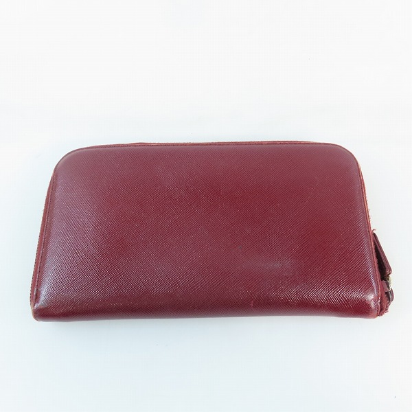 実際に弊社で買取させて頂いたPRADA/プラダ サフィアーノレザー ラウンドジップ長財布 の画像 1枚目