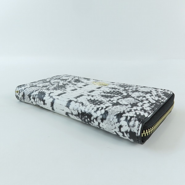 実際に弊社で買取させて頂いたCOACH/コーチ 蛇柄 ラウンドジップ 長財布の画像 2枚目