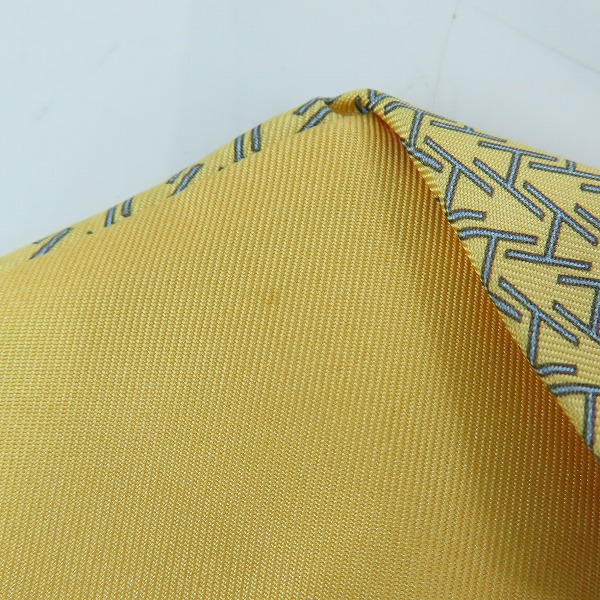 実際に弊社で買取させて頂いたHERMES/エルメス 総柄 イエロー シルク  ネクタイの画像 5枚目