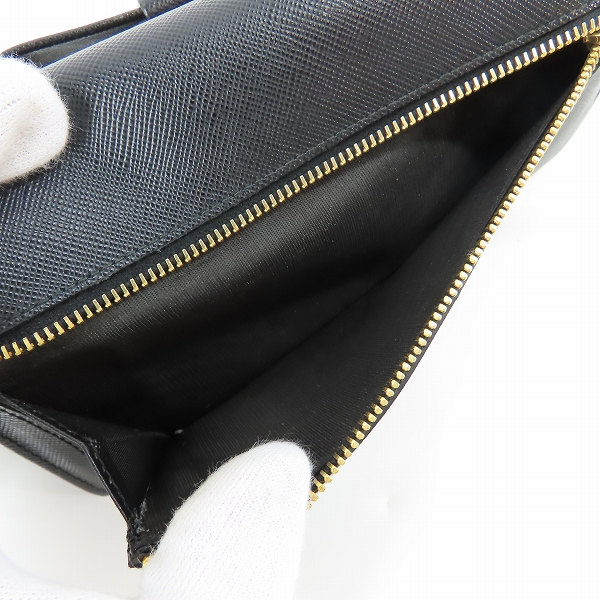 実際に弊社で買取させて頂いたPRADA/プラダ サフィアーノレザー リボン 二つ折り長財布 の画像 5枚目