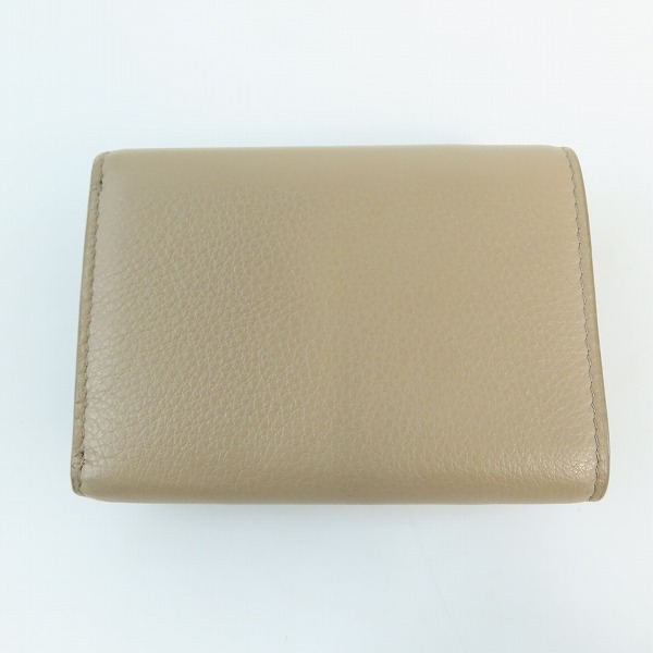 実際に弊社で買取させて頂いたPRADA/プラダ サフィアーノトライアングル レザー3つ折り財布 1MH021 の画像 1枚目