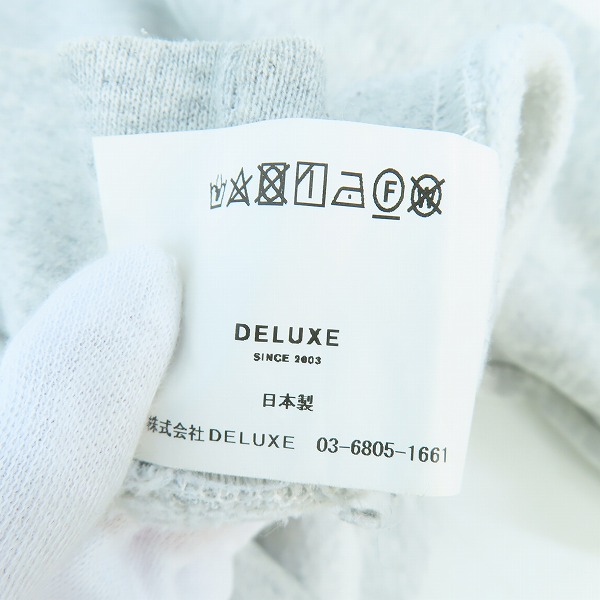 実際に弊社で買取させて頂いたDELUXE/デラックス ダメージ加工 クルーネック スウェットシャツ/XL の画像 4枚目