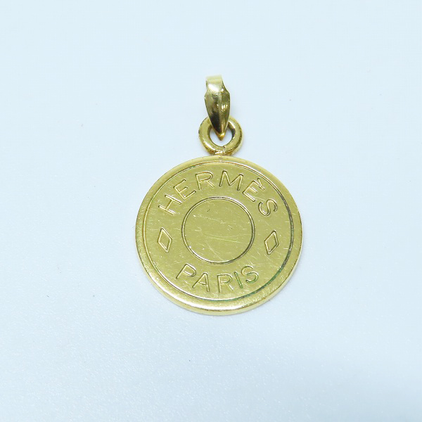 実際に弊社で買取させて頂いたHERMES/エルメス セリエ コイン チャーム/ペンダントトップ k18の画像 1枚目