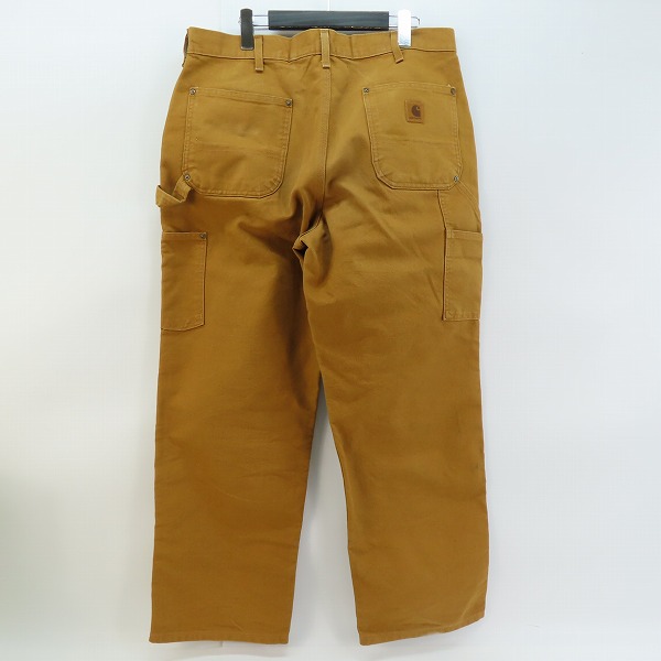 実際に弊社で買取させて頂いたCarhartt/カーハート WASHED-DUCK DOUBLE-FRONT WORK DUNGAREE ダック ダブルニー ペインター パンツ B136-BRN/36×30の画像 1枚目