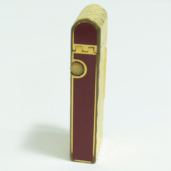 実際に弊社で買取させて頂いたdunhill/ダンヒル 槌目/2面加工 サイドローラー ドーム型 ガスライター ゴールドの画像 2枚目