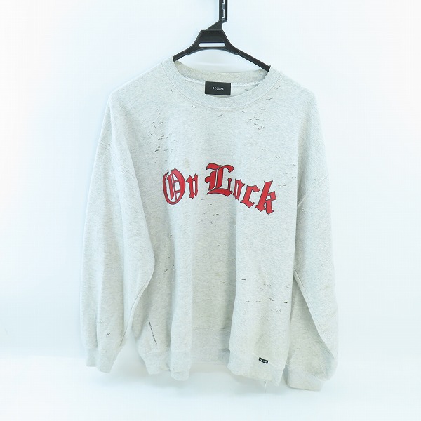 実際に弊社で買取させて頂いたDELUXE/デラックス ダメージ加工 クルーネック スウェットシャツ/XL 