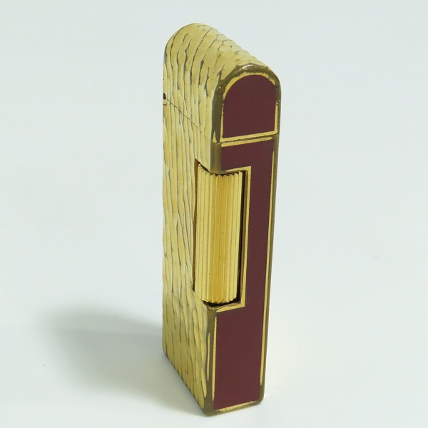 実際に弊社で買取させて頂いたdunhill/ダンヒル 槌目/2面加工 サイドローラー ドーム型 ガスライター ゴールドの画像 3枚目