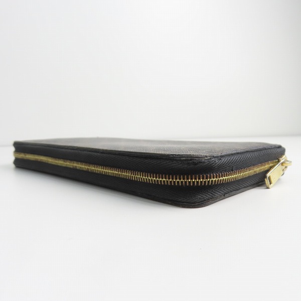 実際に弊社で買取させて頂いたCELINE/セリーヌ ラージ ジップウォレット トリオンフ キャンバス 長財布 10B552BQ3 の画像 2枚目