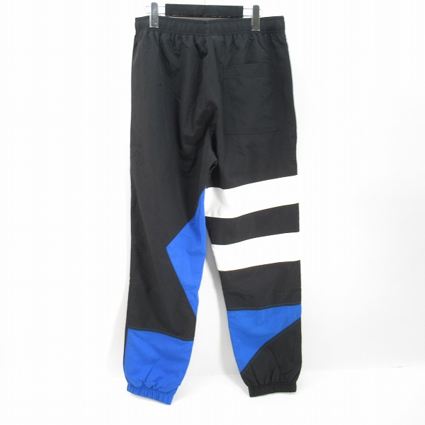 実際に弊社で買取させて頂いたLACOSTE/ラコステ アシンメトリー パッチワーク トラックパンツ XH0116/Mの画像 1枚目