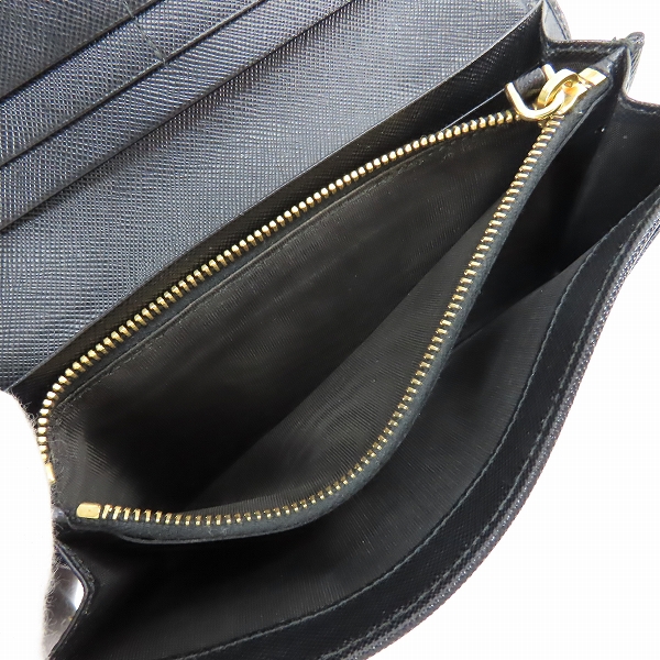 実際に弊社で買取させて頂いたPRADA/プラダ サフィアーノレザー リボン 二つ折り長財布 の画像 4枚目