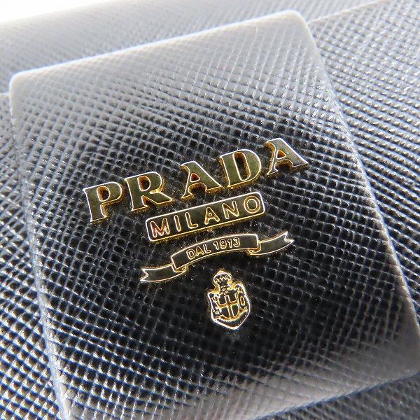 実際に弊社で買取させて頂いたPRADA/プラダ サフィアーノレザー リボン 二つ折り長財布 の画像 7枚目