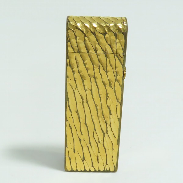 実際に弊社で買取させて頂いたdunhill/ダンヒル 槌目/2面加工 サイドローラー ドーム型 ガスライター ゴールドの画像 1枚目