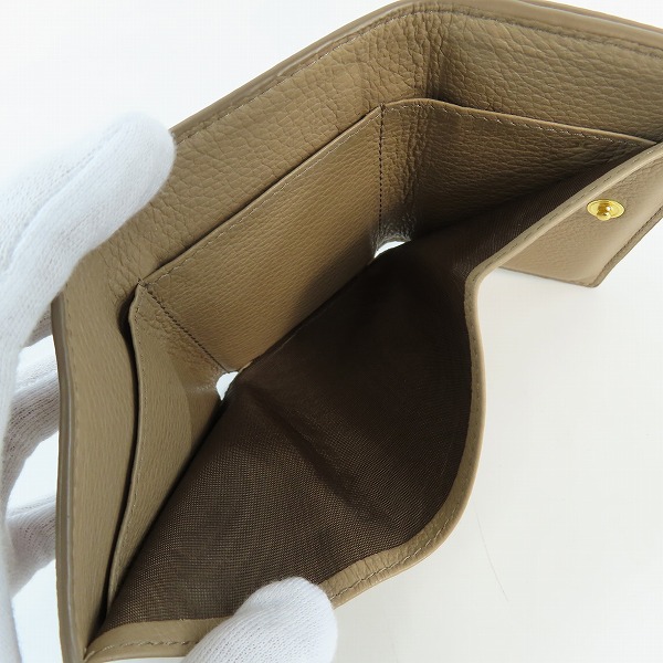 実際に弊社で買取させて頂いたPRADA/プラダ サフィアーノトライアングル レザー3つ折り財布 1MH021 の画像 4枚目