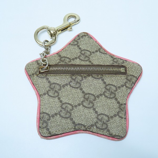 実際に弊社で買取させて頂いたGUCCI/グッチ GGスプリーム スター 星 コインケース 小銭入れ PVC レザー フック付きの画像 1枚目