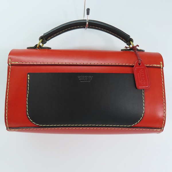 実際に弊社で買取させて頂いたHERZ/ヘルツ プリンショルダー 2way ショルダーバッグ/ハンドバッグ レッド×ブラックの画像 1枚目