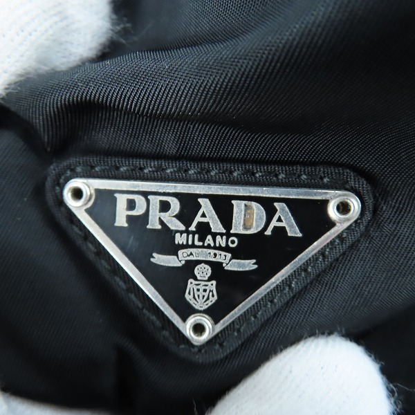 実際に弊社で買取させて頂いた【ジャンク】PRADA/プラダ 三角ロゴプレート ナイロン ミニリュックサックの画像 4枚目