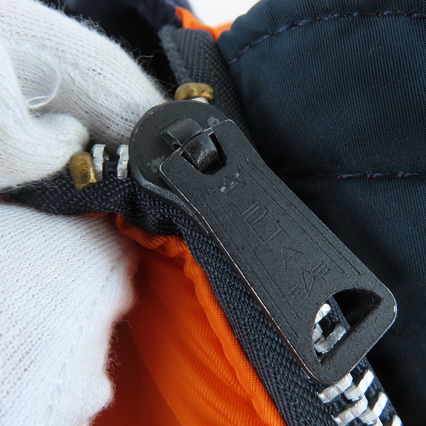 実際に弊社で買取させて頂いたALPHA INDUSTRIES/アルファインダストリーズ フライトジャケット MA-1 ネイビー/オレンジ MIL-J-82790J/Lの画像 7枚目