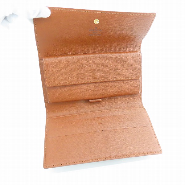 実際に弊社で買取させて頂いたLOUIS VUITTON/ルイヴィトン モノグラム ポルトトレゾール インターナショナル 3つ折り長財布/M61215の画像 3枚目