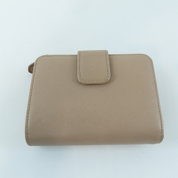 実際に弊社で買取させて頂いたPRADA/プラダ サフィアーノ コンパクトウォレット/二つ折り財布の画像 1枚目