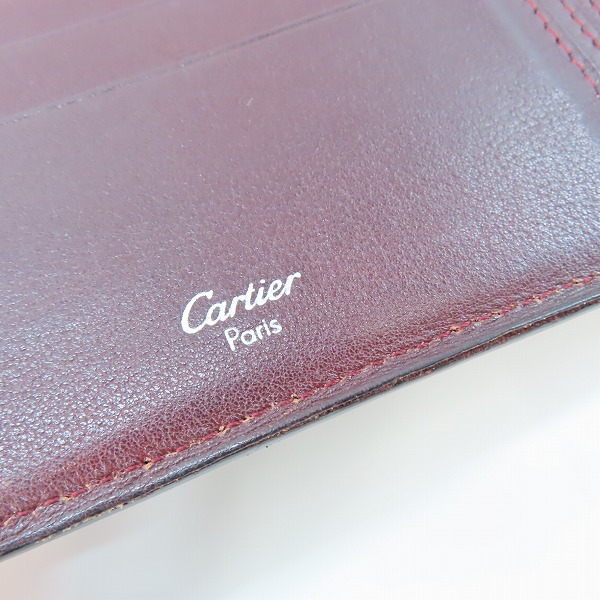 実際に弊社で買取させて頂いたCartier/カルティエ 二つ折り 財布 ブラックの画像 4枚目
