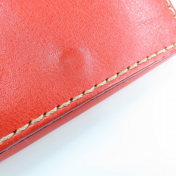 実際に弊社で買取させて頂いたHERZ/ヘルツ レザー 二つ折り財布 レッドの画像 6枚目