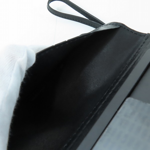 実際に弊社で買取させて頂いたISAMU KATAYAMA BACKLASH/バックラッシュ  携帯カバー 墨染めウォレット スマホケース 849-03の画像 4枚目