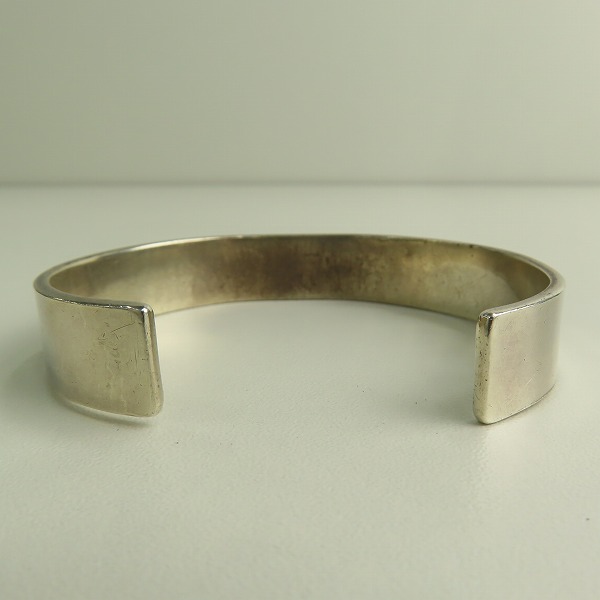 実際に弊社で買取させて頂いたARIZONA FREEDOM/アリゾナフリーダム K18 太陽神 石付き 唐草 バングルの画像 3枚目