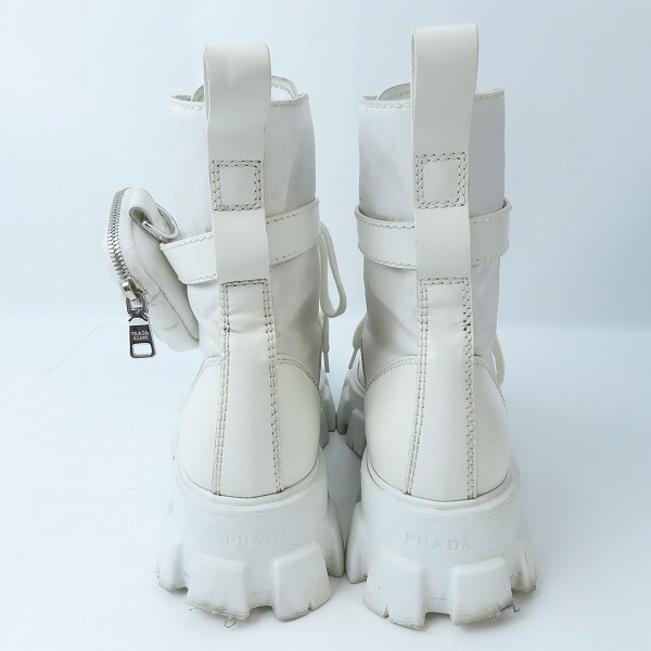 実際に弊社で買取させて頂いたPRADA/プラダ モノリス ポーチ付きレザーコンバットブーツ 2UE007/9の画像 1枚目