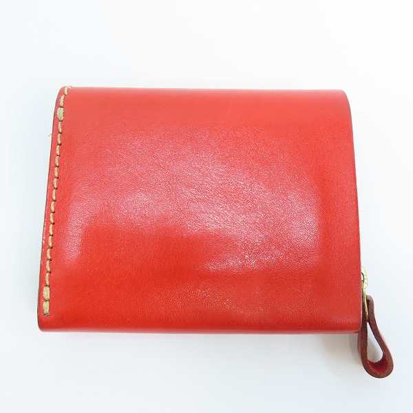 実際に弊社で買取させて頂いたHERZ/ヘルツ レザー 二つ折り財布 レッドの画像 1枚目