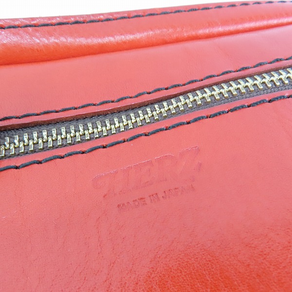 実際に弊社で買取させて頂いたHERZ/ヘルツ 二部屋ソフト ハンドバッグ/クラッチバッグ レッドの画像 5枚目