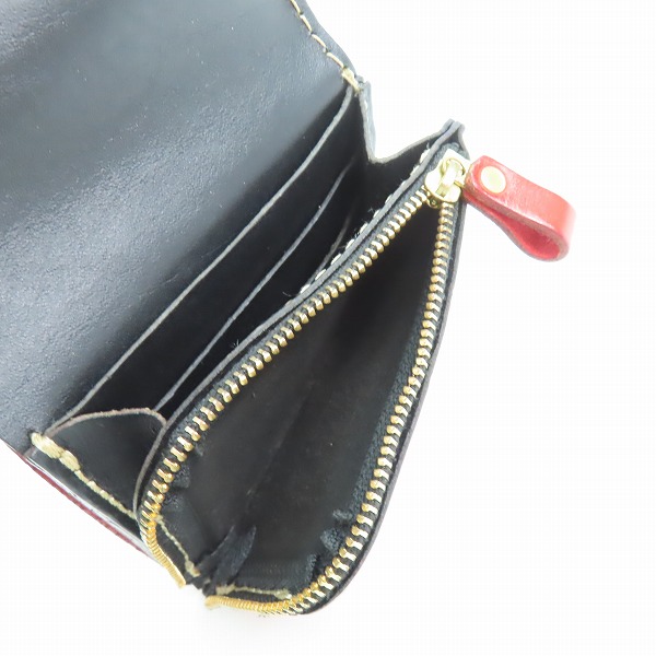 実際に弊社で買取させて頂いたHERZ/ヘルツ レザー 二つ折り財布 レッドの画像 5枚目