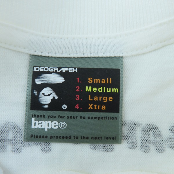 実際に弊社で買取させて頂いたA BATHING APE×KAWS/アベイジングエイプ×カウズ  初期タグ プリント Tシャツ /Mの画像 2枚目