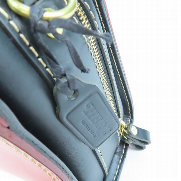 実際に弊社で買取させて頂いたHERZ/ヘルツ ラウンドファスナー 2way レザー ハンドバッグ/ショルダーバッグ レッド×ブラックの画像 7枚目